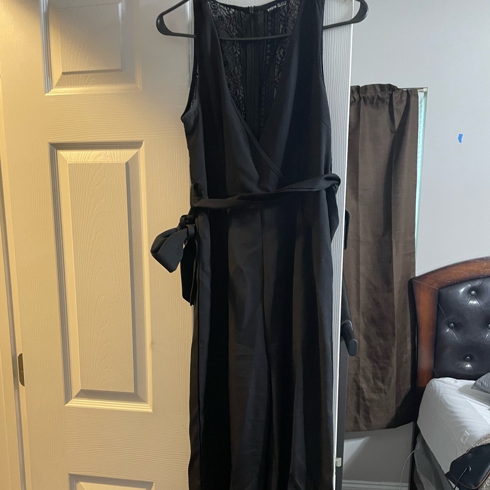 Black dressy romper used once size small